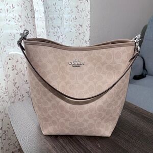 Coach Tan Shoulder Bag with Signature Pattern and Adjustable Strap